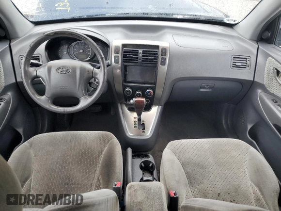 2005 Hyundai Tucson GLS with VIN KM8JN12D05U074879, listed as a Copart auction lot 73746674 with 0 mi miles and Salvage Title. Bid and sale history available at carsss.com. Image 8.