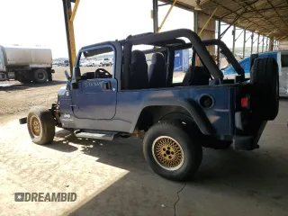 2005 Jeep Wrangler Unlimited с VIN 1J4FA44S65P376026, выставлен на аукционе Copart как лот 57692645 с пробегом Не указан миль и Чистый • Clean title. История ставок и продаж доступна на DreamBid. Изображение 2.