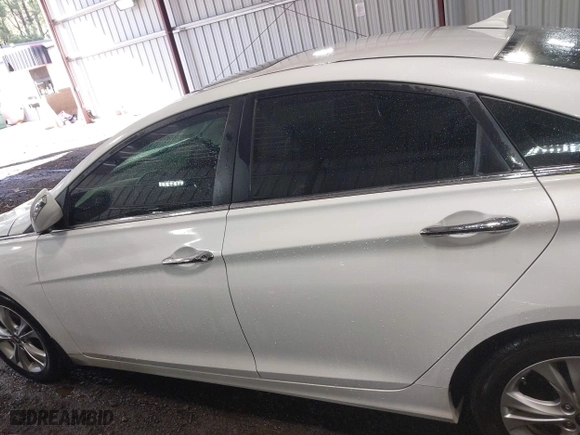 2013 Hyundai Sonata SE with VIN 5NPEC4AC0DH599584, listed as a IAAI auction lot 41961659 with 122,296 mi miles. Bid and sale history available at carsss.com. Image 14.