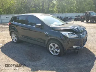 2016 Ford Escape SE with VIN 1FMCU9G93GUA77437, listed as a Copart auction lot 51807905 with 128,261 mi miles and Salvage Title. Bid and sale history available at DreamBid. Image 4.