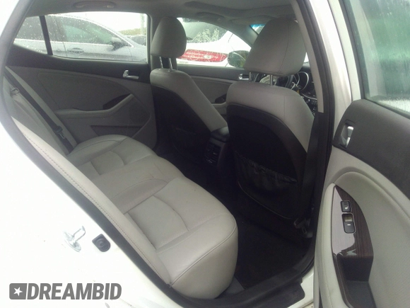 2015 Kia Optima EX with VIN 5XXGN4A71FG493648, listed as a IAAI auction lot 32483878 with Not provided miles and . Bid and sale history available at DreamBid. Image 8.