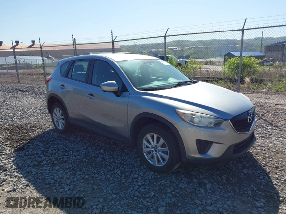 2013 Mazda CX-5 Sport with VIN JM3KE4BE0D0125748, listed as a IAAI auction lot 42143020 with 158,580 mi miles. Bid and sale history available at carsss.com. Image 1.