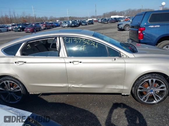 2017 Ford Fusion Titanium with VIN 3FA6P0K91HR309740, listed as a IAAI auction lot 41373824 with 95,499 mi miles and . Bid and sale history available at DreamBid. Image 14.