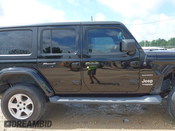 2019 Jeep Wrangler Unlimited Sahara with VIN 1C4HJXEN9KW514880, listed as a IAAI auction lot 42319437 with 70,186 mi miles and . Bid and sale history available at DreamBid. Image 14.