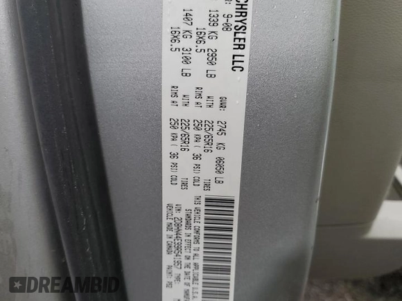 2009 Dodge Grand Caravan SE with VIN 2D8HN44E99R541957, listed as a Copart auction lot 60810425 with 172,392 mi miles and Salvage title. Bid and sale history available at DreamBid. Image 13.