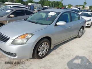 2009 Nissan Altima SL with VIN 1N4AL21E59C147031, listed as a IAAI auction lot 42434371 with 250,060 mi miles and . Bid and sale history available at DreamBid. Image 2.