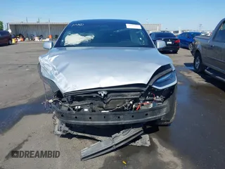 2016 Tesla Model X 70D with VIN 5YJXCAE21GF033123, listed as a IAAI auction lot 39813497 with 162,509 mi miles and . Bid and sale history available at DreamBid. Image 13.