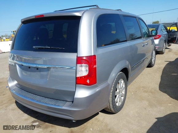 2014 Chrysler Town & Country Touring with VIN 2C4RC1BGXER211850, listed as a IAAI auction lot 41997769 with 164,406 mi miles. Bid and sale history available at carsss.com. Image 4.