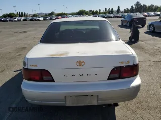 1996 Toyota Camry LE z VIN JT2BF12K3T0139807, wystawiony jako Copart lot #57675855 z przebiegiem 258 601 mil mil oraz Szkoda całkowita • Salvage title. Historia ofert i sprzedaży dostępna na DreamBid. Obrazek 6.