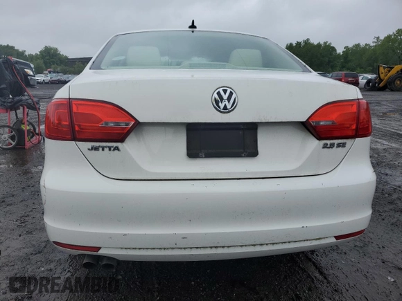 2013 Volkswagen Jetta SE z VIN 3VWBX7AJXDM432714, wystawiony jako Copart lot #61093845 z przebiegiem 69 098 mil mil oraz Czysty tytuł • Clean title. Historia ofert i sprzedaży dostępna na DreamBid. Obrazek 6.