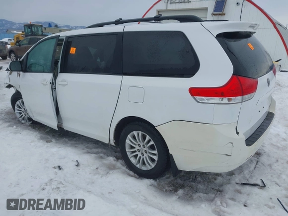 2014 Toyota Sienna XLE with VIN 5TDYK3DC9ES442525, listed as a IAAI auction lot 41502770 with Not provided miles and . Bid and sale history available at DreamBid. Image 3.