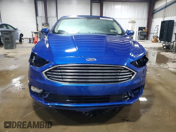 2018 Ford Fusion Titanium с VIN 3FA6P0D90JR159218, выставлен на аукционе Copart как лот 63766945 с пробегом 115 529 миль миль и Списание • Salvage title. История ставок и продаж доступна на DreamBid. Изображение 5.