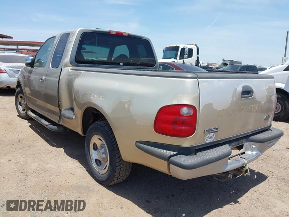 2000 Ford F-150 XL with VIN 1FTRX07W6YKB19703, listed as a IAAI auction lot 42375355 with Not provided miles and . Bid and sale history available at DreamBid. Image 3.