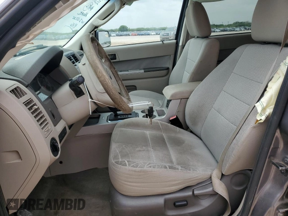 2010 Ford Escape XLT с VIN 1FMCU0D72AKD21676, выставлен на аукционе Copart как лот 55268255 с пробегом 172 355 миль миль и Списание • Salvage title. История ставок и продаж доступна на DreamBid. Изображение 7.