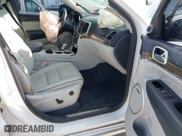 2018 Jeep Grand Cherokee Summit with VIN 1C4RJEJG3JC394624, listed as a IAAI auction lot 41412939 with 80,180 mi miles and . Bid and sale history available at DreamBid. Image 5.