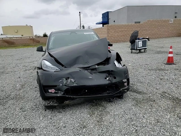 2024 Tesla Model Y Long Range with VIN 7SAYGDEE5RA219609, listed as a Copart auction lot 44339265 with 20,702 mi miles and Salvage Title. Bid and sale history available at carsss.com. Image 10.