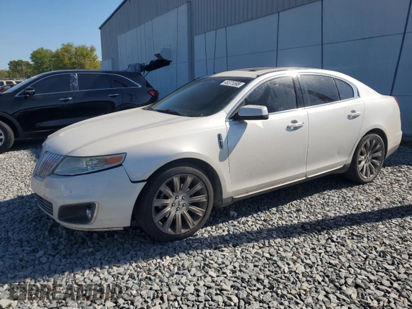 2012 Lincoln MKS with VIN 1LNHL9DR1CG805164, listed as a Copart auction lot 48375595 with 104,246 mi miles and Salvage Title. Bid and sale history available at carsss.com. Image 1.