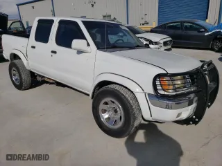 2000 Nissan Frontier 2WD XE with VIN 1N6ED27T0YC327947, listed as a Copart auction lot 48729875 with 230,398 mi miles and Salvage Title. Bid and sale history available at carsss.com. Image 4.