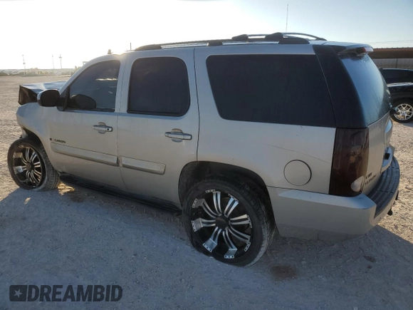 2009 GMC Yukon SLE w/3SB with VIN 1GKFK23079R128194, listed as a Copart auction lot 77213554 with 224,172 mi miles and Salvage Title. Bid and sale history available at carsss.com. Image 2.
