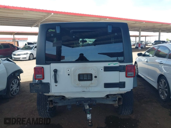 2015 Jeep Wrangler Unlimited Rubicon with VIN 1C4BJWFG9FL744927, listed as a IAAI auction lot 42169740 with 106,352 mi miles and . Bid and sale history available at DreamBid. Image 17.