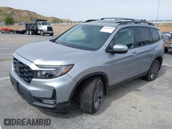 2023 Honda Passport EX-L with VIN 5FNYF8H53PB034963, listed as a IAAI auction lot 41686154 with 12,572 mi miles and . Bid and sale history available at carsss.com. Image 17.