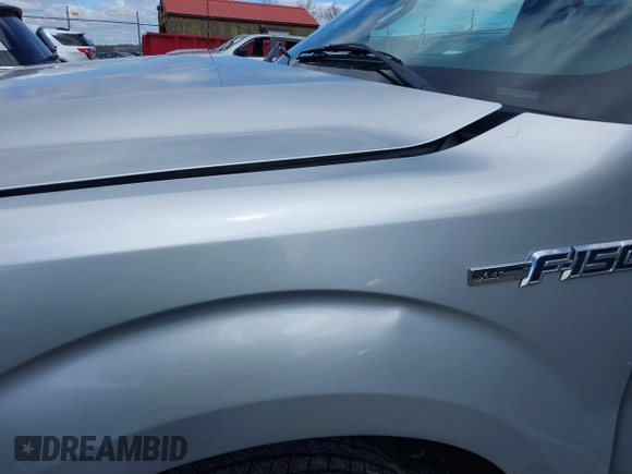 2013 Ford F-150 XL with VIN 1FTFW1EF1DFC24375, listed as a IAAI auction lot 41977313 with 326,090 mi miles. Bid and sale history available at carsss.com. Image 18.
