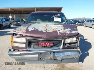 1997 GMC Suburban z VIN 1GKEC16RXVJ703491, wystawiony jako IAAI lot #41219414 z przebiegiem 362 551 mil mil oraz . Historia ofert i sprzedaży dostępna na DreamBid. Obrazek 12.
