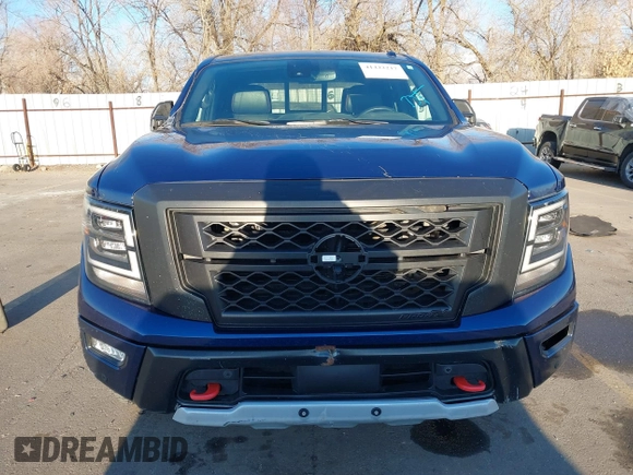 2021 Nissan Titan Pro-4X z VIN 1N6AA1ED1MN517476, wystawiony jako IAAI lot #41422217 z przebiegiem 62 650 mil mil oraz . Historia ofert i sprzedaży dostępna na DreamBid. Obrazek 12.