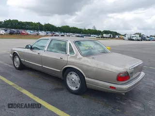 1997 Jaguar XJ with VIN SAJHX1243VC811786, listed as a IAAI auction lot 41451521 with Not provided miles and . Bid and sale history available at DreamBid. Image 3.