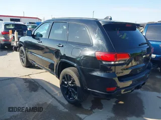 2017 Jeep Grand Cherokee Laredo with VIN 1C4RJFAGXHC817666, listed as a IAAI auction lot 42036817 with 119,698 mi miles. Bid and sale history available at carsss.com. Image 3.