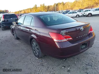 2007 Toyota Avalon XL with VIN 4T1BK36B27U220574, listed as a IAAI auction lot 41283334 with 125,336 mi miles. Bid and sale history available at carsss.com. Image 3.
