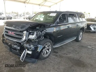 2016 GMC Yukon XL SLE with VIN 1GKS1FKC2GR147222, listed as a IAAI auction lot 41390201 with 86,385 mi miles. Bid and sale history available at carsss.com. Image 2.