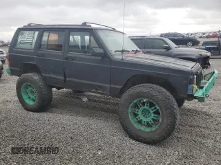 1993 Jeep Cherokee Sport with VIN 1J4FJ68S6PL506709, listed as a Copart auction lot 86638434 with 253,923 mi miles and Salvage Title. Bid and sale history available at carsss.com. Image 4.