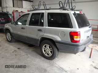 2004 Jeep Grand Cherokee Laredo with VIN 1J4GW48S44C161864, listed as a IAAI auction lot 42764536 with 143,833 mi miles and . Bid and sale history available at DreamBid. Image 3.