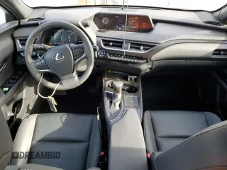 2022 Lexus UX 250h with VIN JTHX9JBH2N2056285, listed as a Copart auction lot 87221214 with 33,377 mi miles and Salvage title. Bid and sale history available at DreamBid. Image 8.