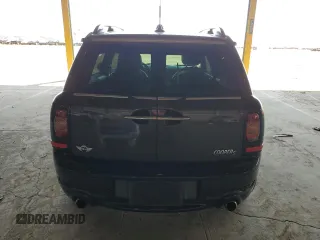 2010 MINI Clubman S z VIN WMWMM3C57ATP94345, wystawiony jako Copart lot #57699265 z przebiegiem 96 313 mil mil oraz Tytuł czysty. Historia ofert i sprzedaży dostępna na DreamBid. Obrazek 6.