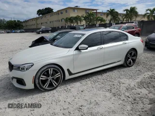 2018 BMW 7 Series 740i xDrive with VIN WBA7E4C51JGV24049, listed as a Copart auction lot 81518624 with 49,000 mi miles and Clean Title. Bid and sale history available at carsss.com. Image 1.