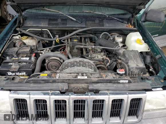 1997 Jeep Grand Cherokee TSi with VIN 1J4FX58S6VC602782, listed as a Copart auction lot 86605074 with 158,971 mi miles and Salvage Title. Bid and sale history available at carsss.com. Image 13.