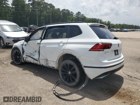 2021 Volkswagen Tiguan SE with VIN 3VV3B7AX7MM130227, listed as a Copart auction lot 63086575 with 80,135 mi miles and Salvage title. Bid and sale history available at DreamBid. Image 2.