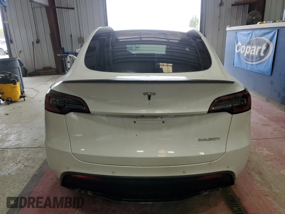 2022 Tesla Model Y Performance with VIN 7SAYGDEF9NF405370, listed as a Copart auction lot 43621095 with 52,292 mi miles and Salvage Title. Bid and sale history available at DreamBid. Image 6.