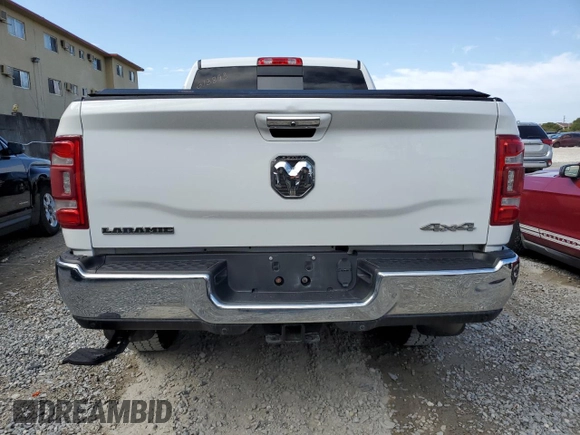 2020 Ram 2500 Laramie with VIN 3C6UR5NL8LG313893, listed as a Copart auction lot 42675764 with 128,135 mi miles and Salvage Title. Bid and sale history available at carsss.com. Image 6.