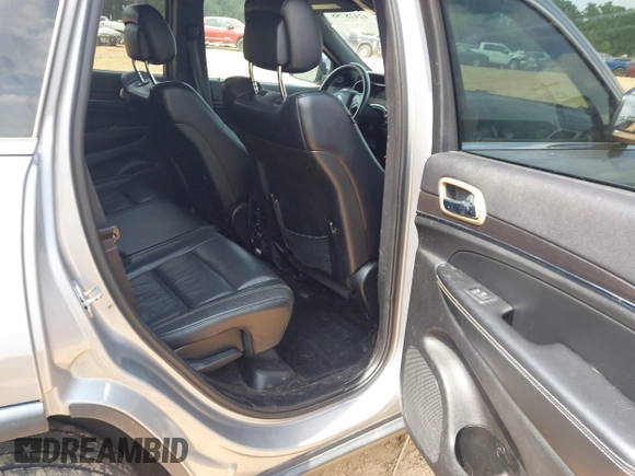 2014 Jeep Grand Cherokee Limited with VIN 1C4RJFBG9EC210507, listed as a IAAI auction lot 42428788 with 141,147 mi miles and . Bid and sale history available at DreamBid. Image 8.