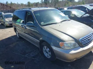 2003 Kia Sedona LX with VIN KNDUP131536414349, listed as a IAAI auction lot 41836104 with 70,130 mi miles. Bid and sale history available at carsss.com. Image 1.