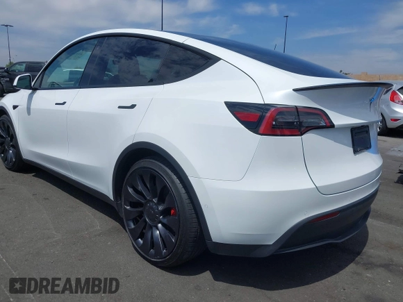 2022 Tesla Model Y Performance with VIN 7SAYGDEF8NF407109, listed as a IAAI auction lot 42014282 with 24,937 mi miles and . Bid and sale history available at DreamBid. Image 3.