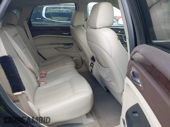 2016 Cadillac SRX Luxury Collection with VIN 3GYFNBE3XGS504059, listed as a IAAI auction lot 42306894 with 87,933 mi miles and . Bid and sale history available at DreamBid. Image 8.