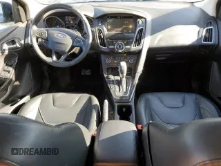 2018 Ford Focus Titanium z VIN 1FADP3N2XJL297048, wystawiony jako Copart lot #61579925 z przebiegiem 68 774 mil mil oraz Szkoda całkowita • Salvage title. Historia ofert i sprzedaży dostępna na DreamBid. Obrazek 8.