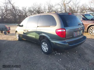 2003 Dodge Caravan SE with VIN 1D4GP24313B150883, listed as a IAAI auction lot 41760786 with 165,718 mi miles. Bid and sale history available at carsss.com. Image 3.
