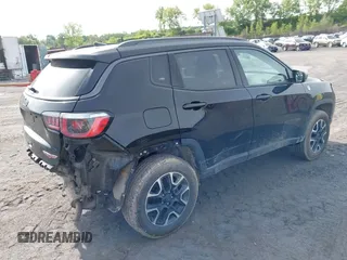 2020 Jeep Compass Trailhawk z VIN 3C4NJDDB7LT195317, wystawiony jako IAAI lot #42325122 z przebiegiem 97 858 mil mil oraz . Historia ofert i sprzedaży dostępna na DreamBid. Obrazek 4.