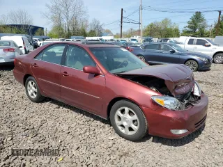 2004 Toyota Camry LE with VIN 4T1BE30K94U361976, listed as a Copart auction lot 54091545 with 193,141 mi miles and Salvage Title. Bid and sale history available at DreamBid. Image 4.