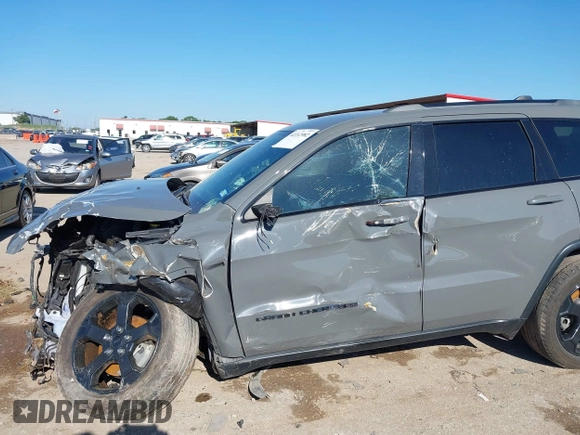2019 Jeep Grand Cherokee Laredo E with VIN 1C4RJFAG2KC611457, listed as a IAAI auction lot 42212982 with 97,603 mi miles and . Bid and sale history available at DreamBid. Image 6.